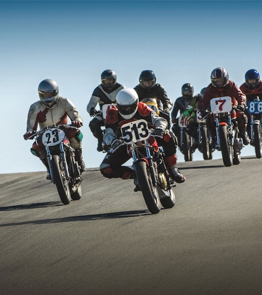 motorscyclists on motorcycles in a race