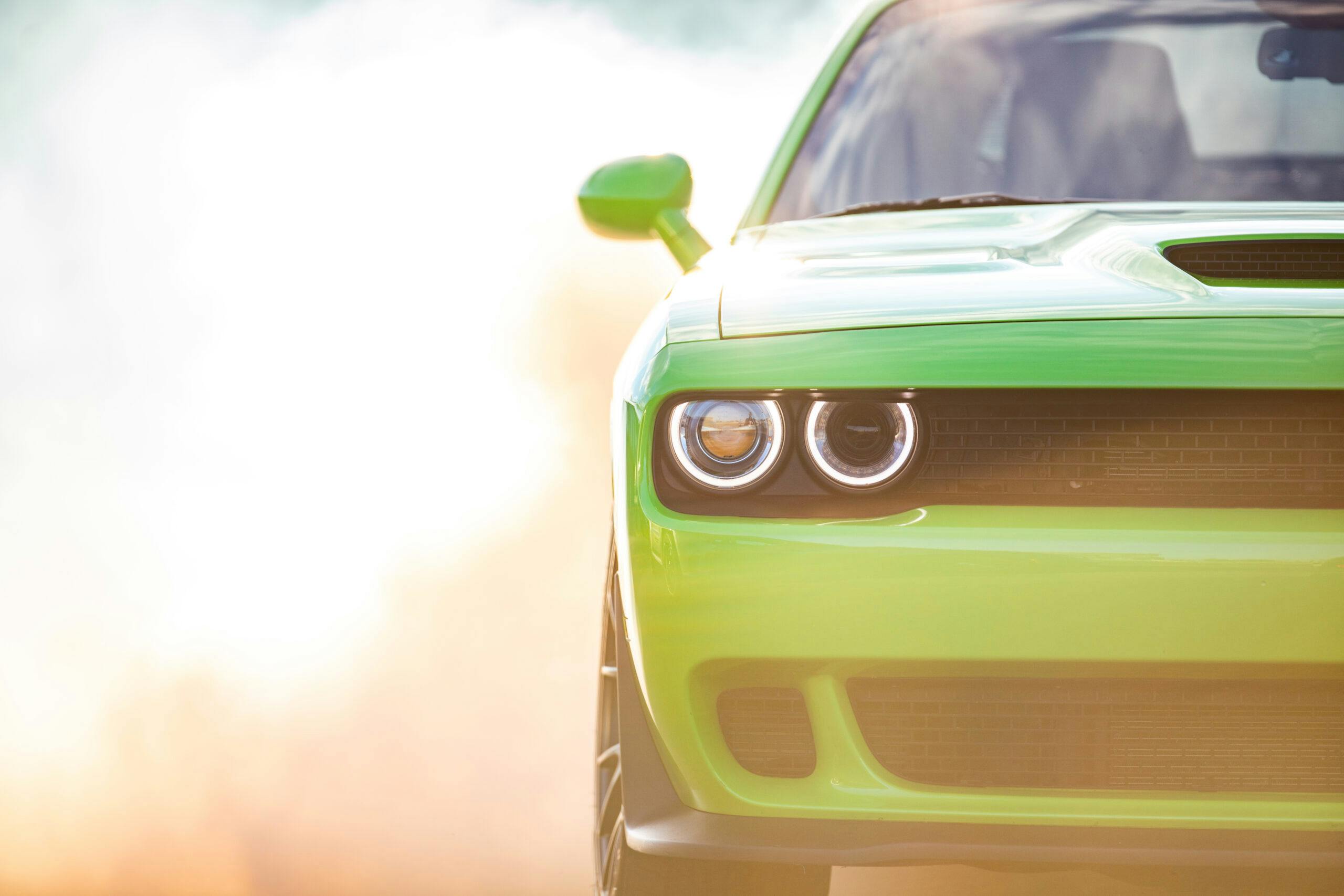 Challenger SRT Hellcat front halved smoking tire