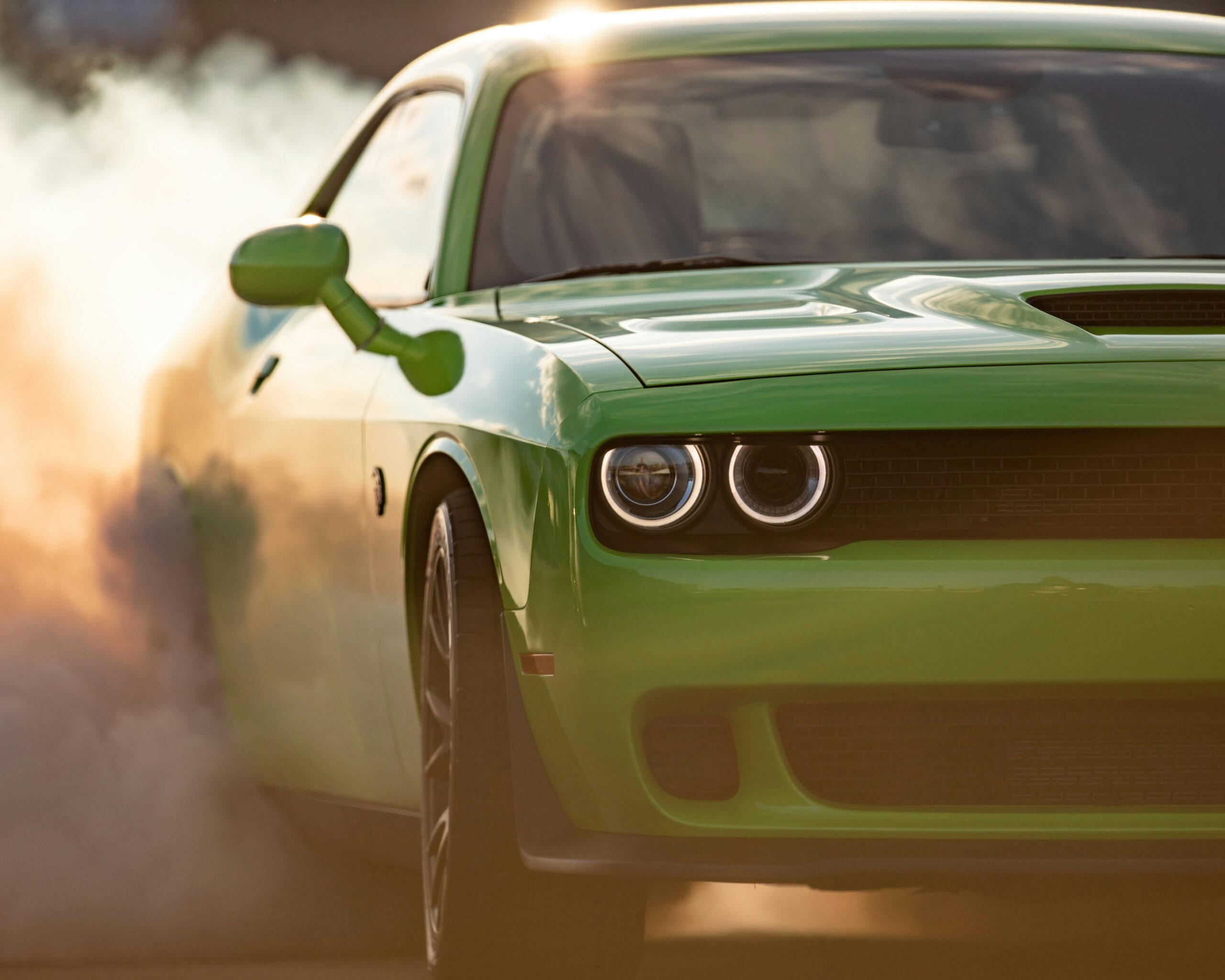 Challenger SRT Hellcat front halved smoking tires